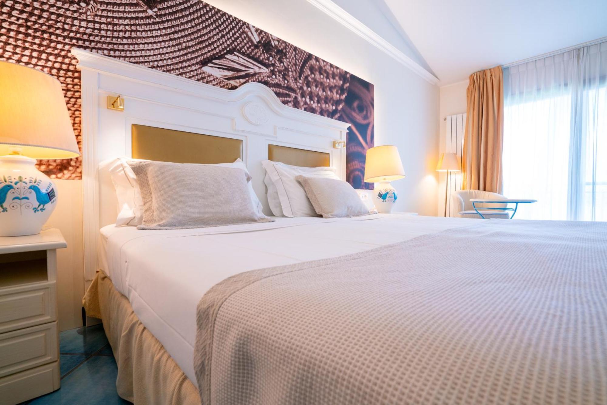 Hotel Santa Gilla Капотера Екстериор снимка